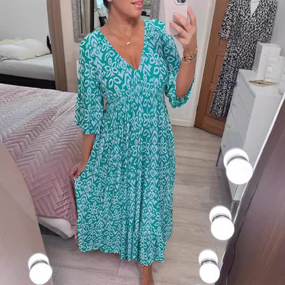 Robe maxi femme avec décolleté en V et motif floral saisissant Chic und Stil