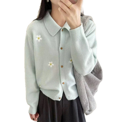 Dame cardigan avec des applications florales et un col classique Chic und Stil