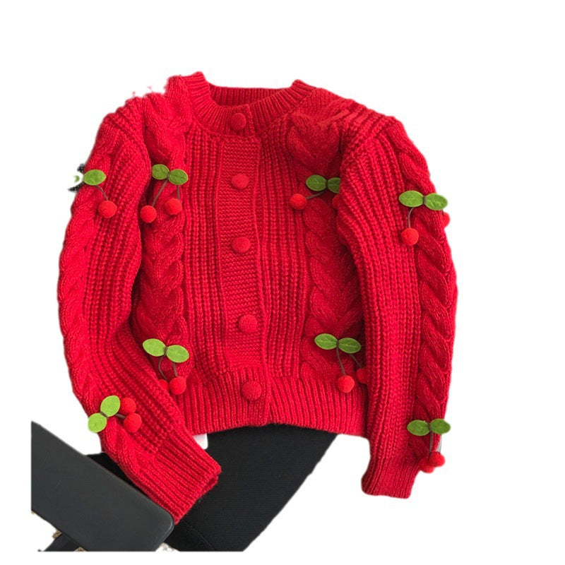 Pull en grosse maille pour femmes avec des appliqués floraux et des détails de boutons Chic und Stil
