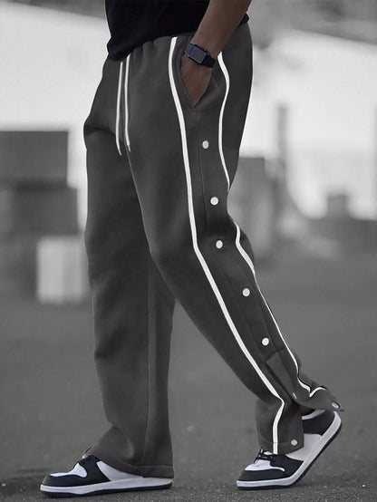 Stylish men's sports pants with snap button details and side pockets Chic and Style