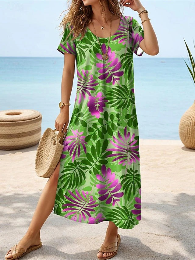 Robe maxi pour femmes avec un design élégant de feuilles tropicales et des fentes latérales Chic und Stil