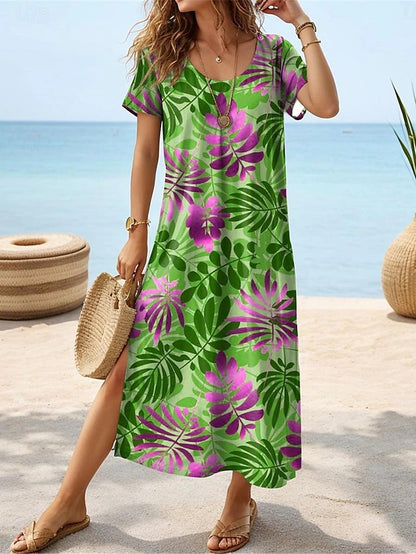 Robe maxi pour femmes avec un design élégant de feuilles tropicales et des fentes latérales Chic und Stil