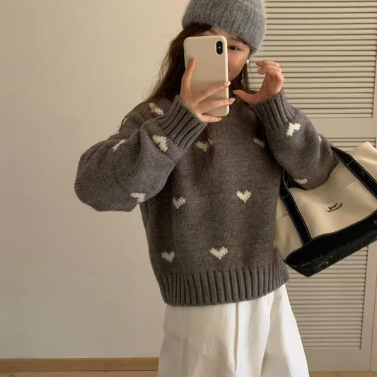 Femmes pull tricoté avec motif cœur et large bande Chic und Stil