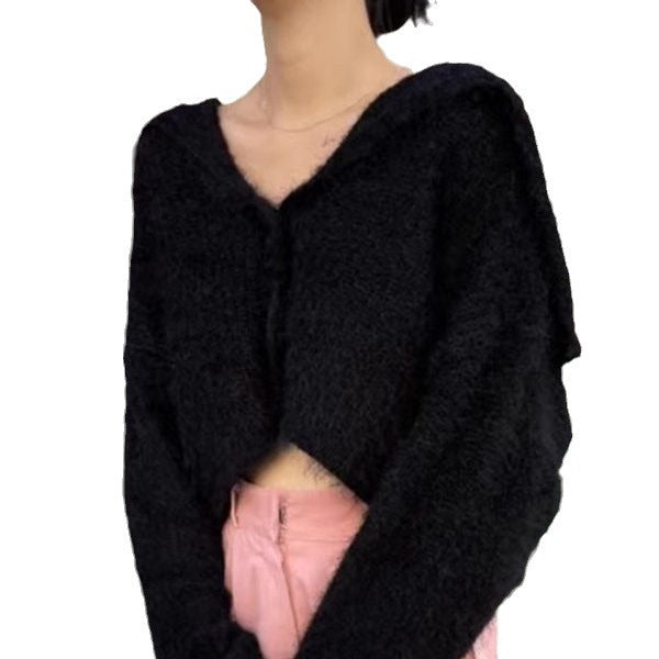 Pull décontracté pour femmes avec décolleté en V profond et motif de mailles texturé Chic und Stil
