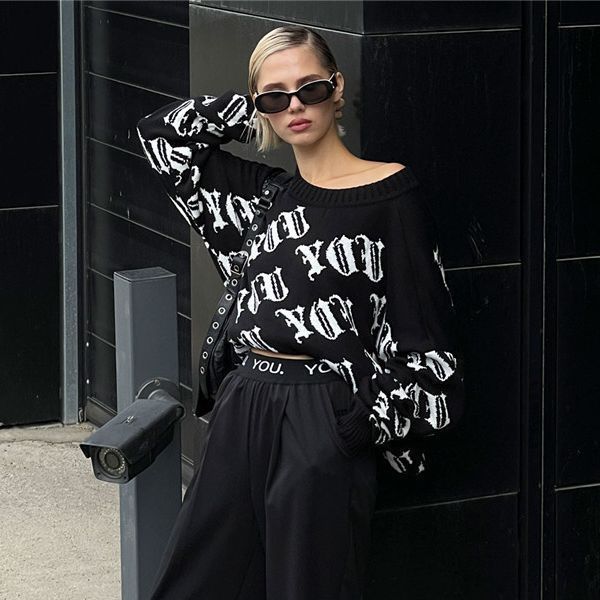 Pull en tricot décontracté pour femmes avec une inscription moderne et une coupe ample Chic und Stil