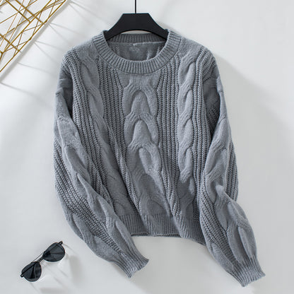 Pull femme en grosse maille avec des manches volumineuses et motif en torsades Chic und Stil