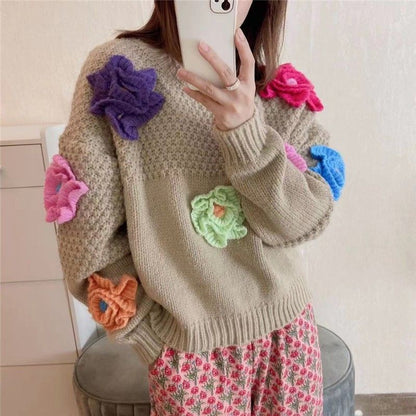 Femme Pull en tricot ludique avec des applications florales Chic und Stil
