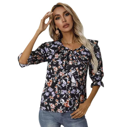 Chemisier femme avec détails froncés et design floral Chic und Stil