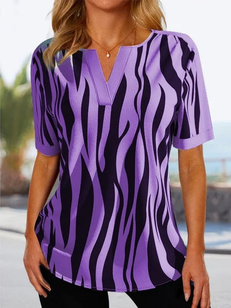 Tunique femme avec un motif de vagues moderne et décolleté en V Chic und Stil