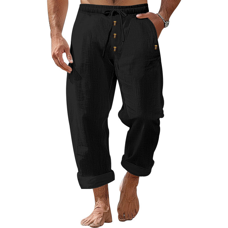 Casual beach pants for men with elastic waistband and practical button details Chic and Style