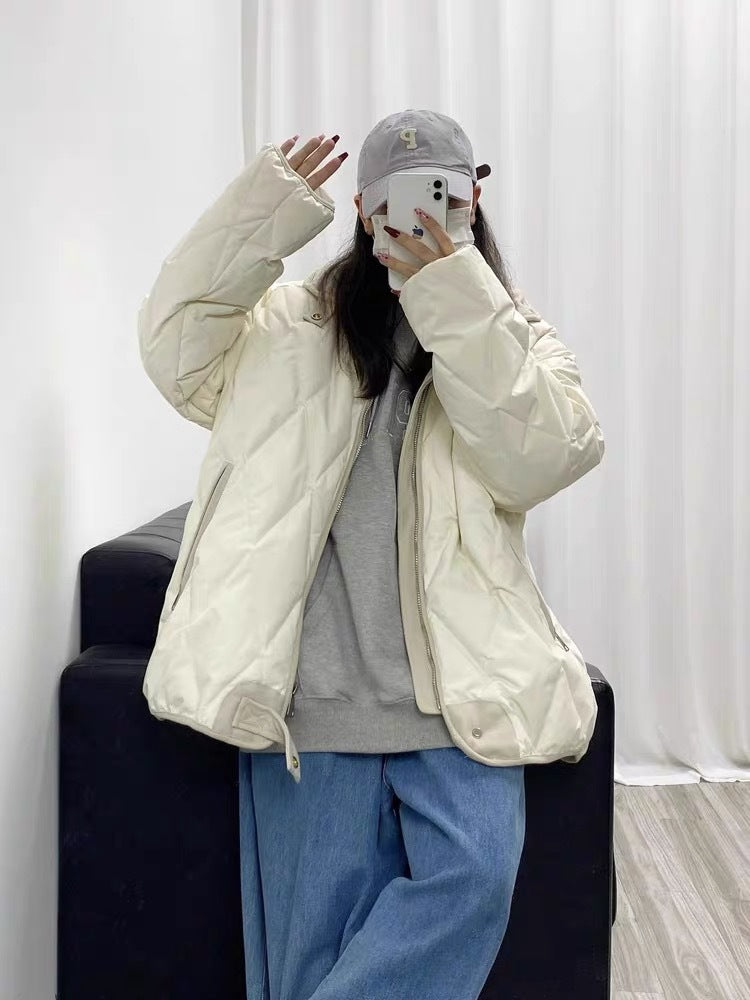 Functional quilted jacket for women with high collar and practical pockets Chic and Style