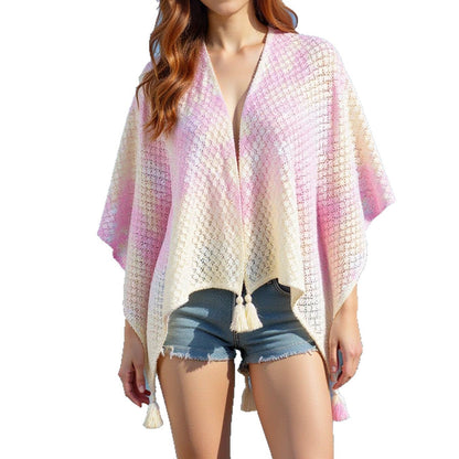 Airy knitted poncho for ladies with decorative fringes Chic and Style