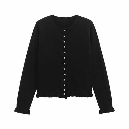 Dames cardigan en tricot confortable avec des boutons décoratifs et un design à volants tendance Chic und Stil