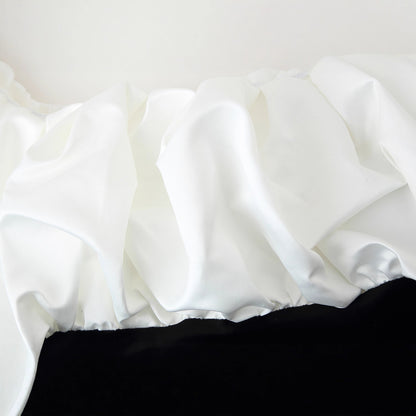 Robe maxi femme avec des détails de volants volumineux et une coupe élégante Chic und Stil