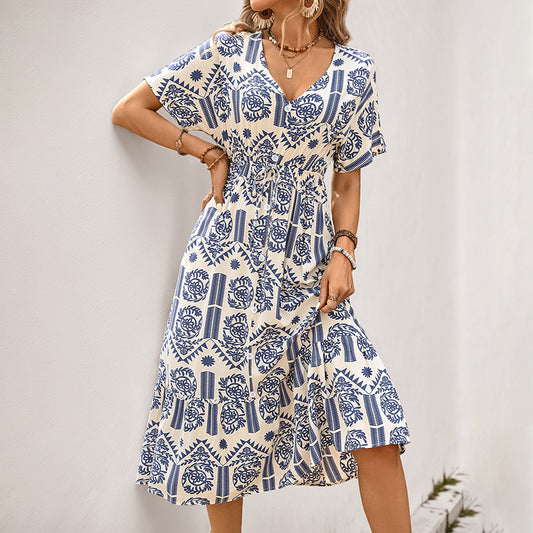 Robe midi femme avec taille à cordon et motif floral Chic und Stil