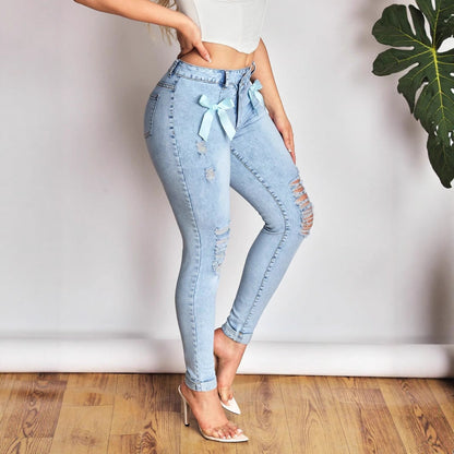 Dames Destroyed Skinny Jeans avec des nœuds fantaisistes Chic und Stil
