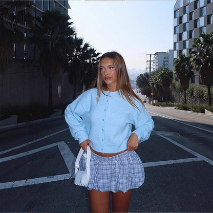 Chic and Style women's casual short knit pullover with button detail