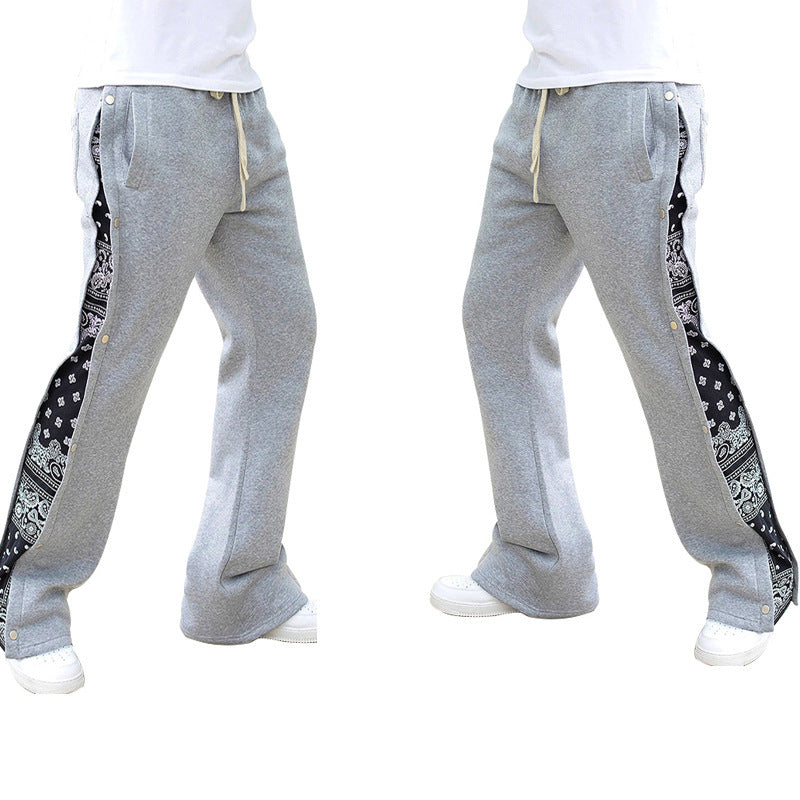 Casual men's jogger pants with side snap button closure and trendy mix of patterns Chic und Stil