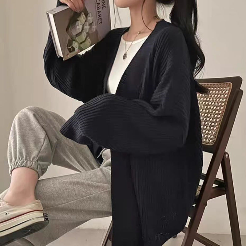 Cardigan en maille douce pour femmes avec une coupe décontractée et des manches posées Chic und Stil