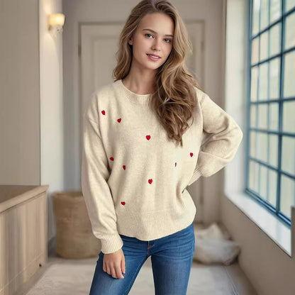 Pull femme avec un design de cœur ludique Chic und Stil