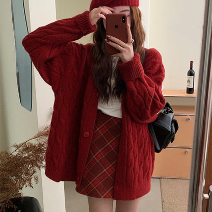 Dames grosse tricot cardigan avec un élégant motif en torsades et des détails de boutons confortables Chic und Stil