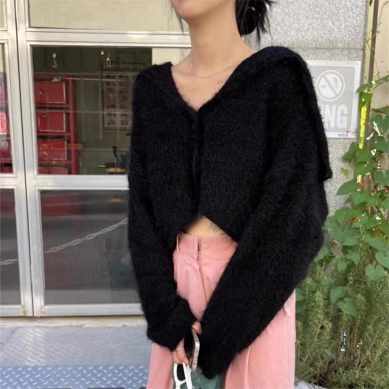 Pull décontracté pour femmes avec décolleté en V profond et motif de mailles texturé Chic und Stil