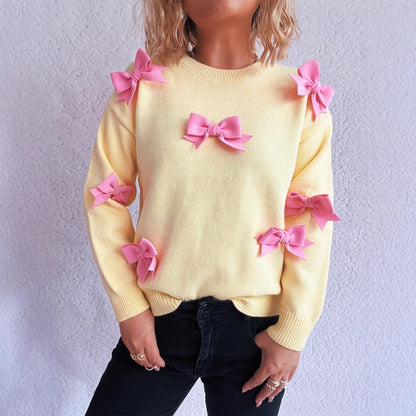 Pull femmes avec des applications de nœuds ludiques Chic und Stil