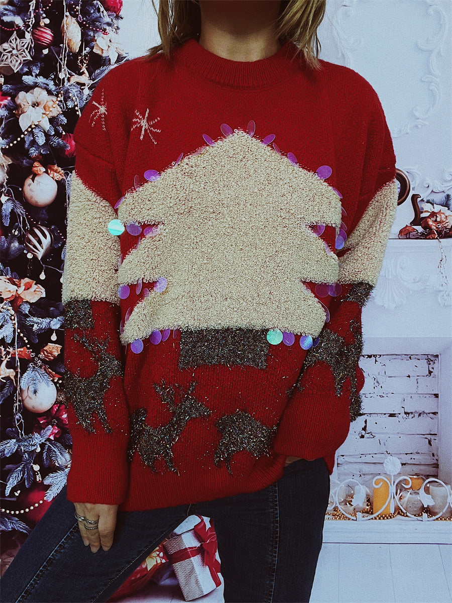 Pull féminin festif avec motif de Noël et appliqués scintillants Chic und Stil