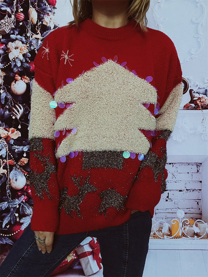Pull féminin festif avec motif de Noël et appliqués scintillants Chic und Stil