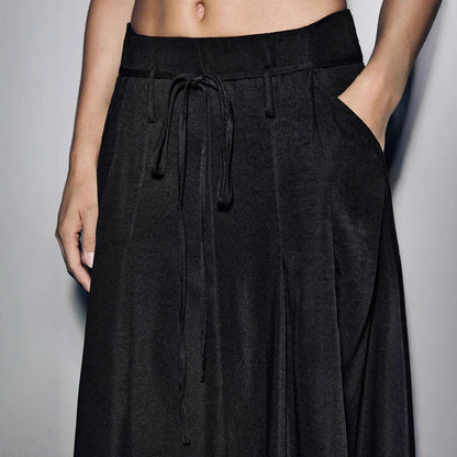 Loose jersey pants for women with a tie belt and practical pockets Chic and Style