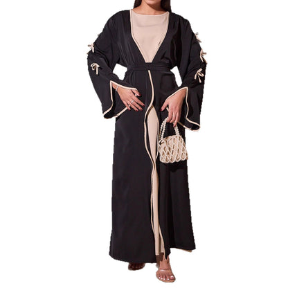 Robe maxi femme avec des détails de nœud élégants et une coupe fluide Chic und Stil