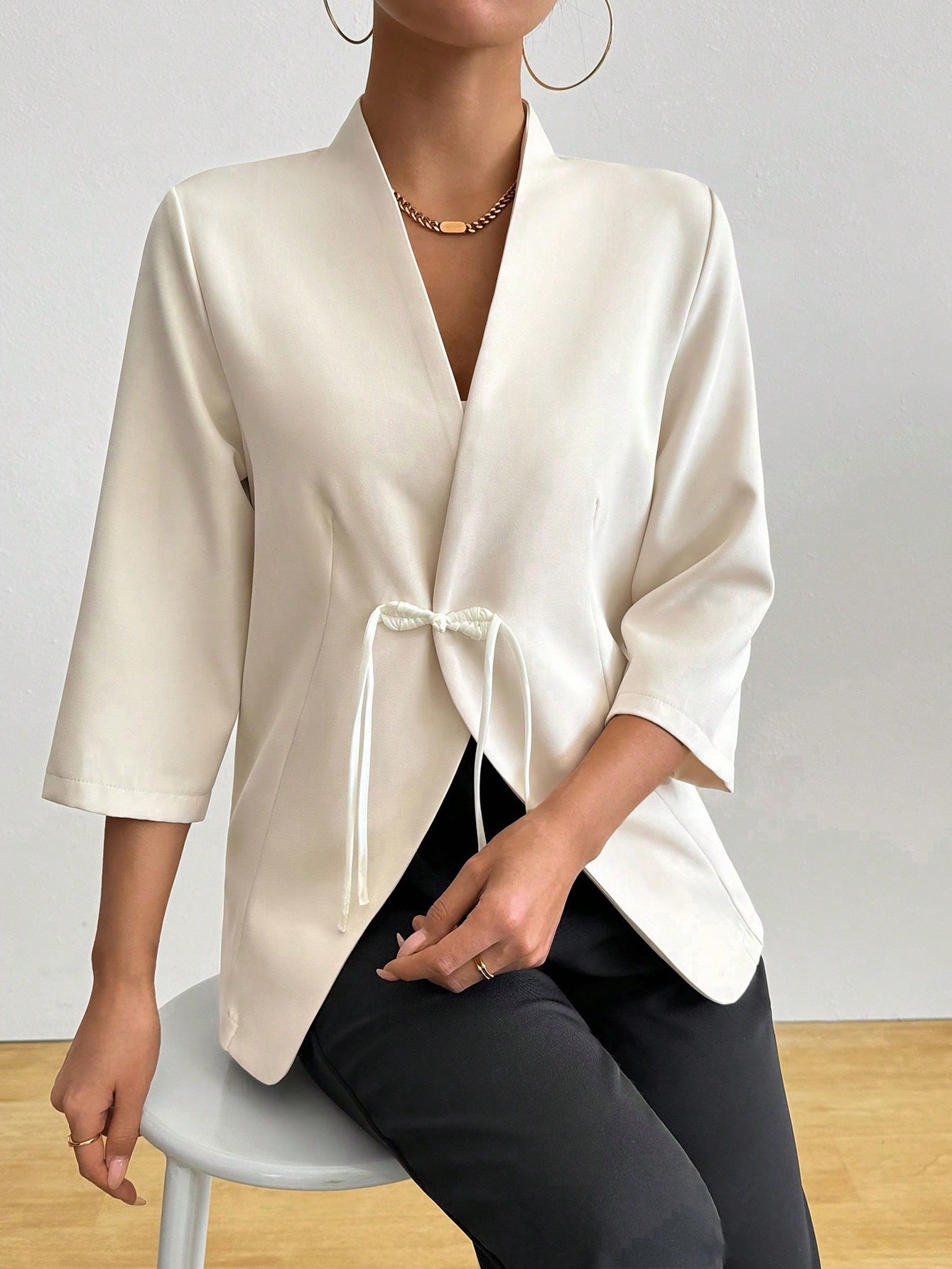 Women's trendy wrap blazer with belted waist and 3/4 sleeves Chic and Style