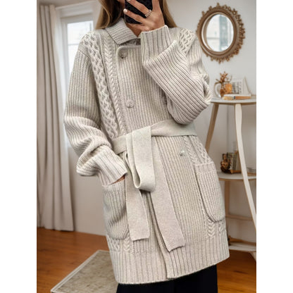 Knitted jacket for women with adjustable belt and textured cable pattern Chic und Stil