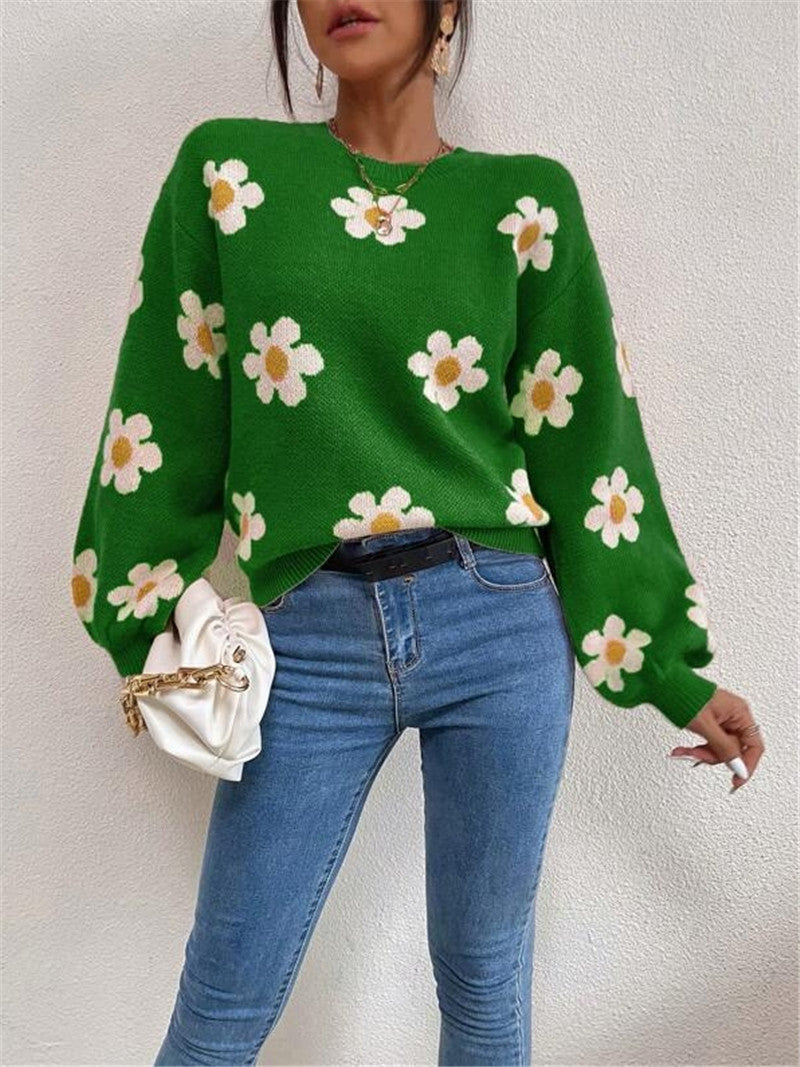 Pull en tricot pour femmes avec un motif floral ludique et des manches bouffantes élégantes Chic und Stil