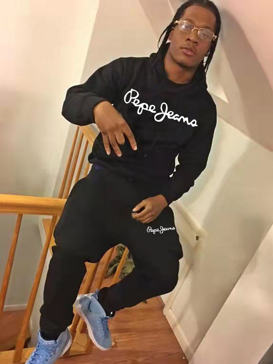 Hoodie and jogger pants for men with contemporary inscription Chic und Stil