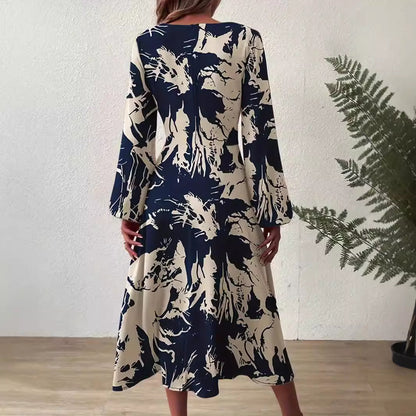 Robe midi pour femmes avec des détails floraux et un élégant décolleté en V Chic und Stil