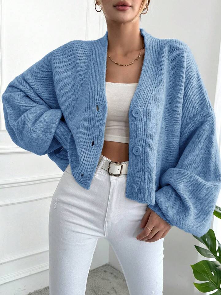 Dames cardigan tricot surdimensionné avec des manches volumineuses et des détails de boutons Chic und Stil