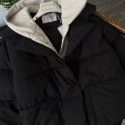 Dames doudoune avec grande capuche et coupe moderne Chic und Stil