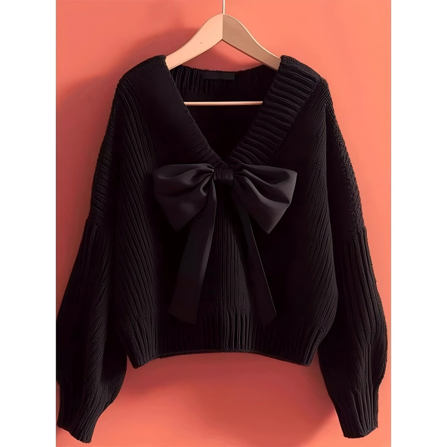 Pull en tricot pour femme avec décolleté en V et accent de nœud décoratif Chic und Stil