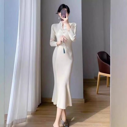 Robe en tricot élégante pour femmes avec col haut et ourlet asymétrique Chic und Stil