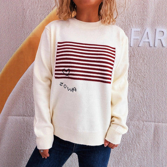 Pull décontracté pour femmes avec design rayé et application en forme de cœur Chic und Stil