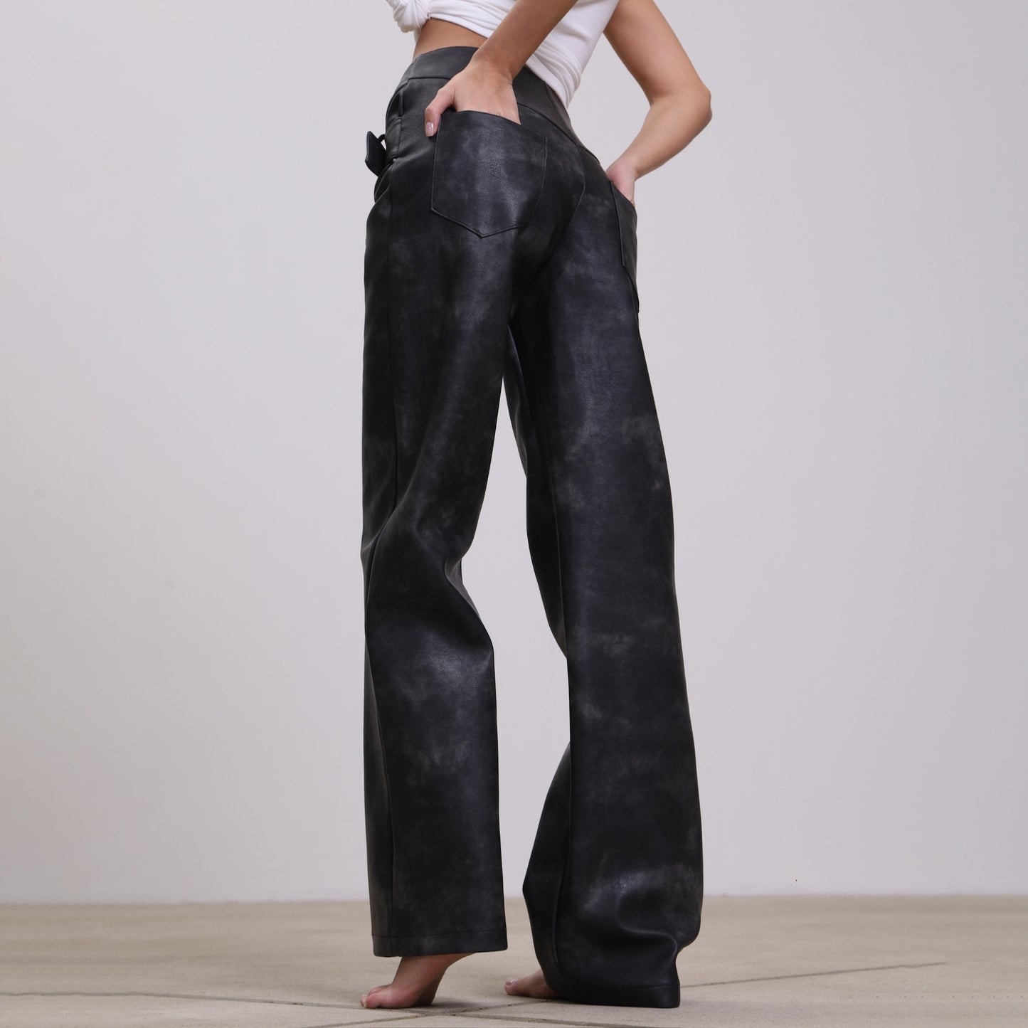 Modern high-waisted faux leather pants for women with adjustable belt Chic and Style