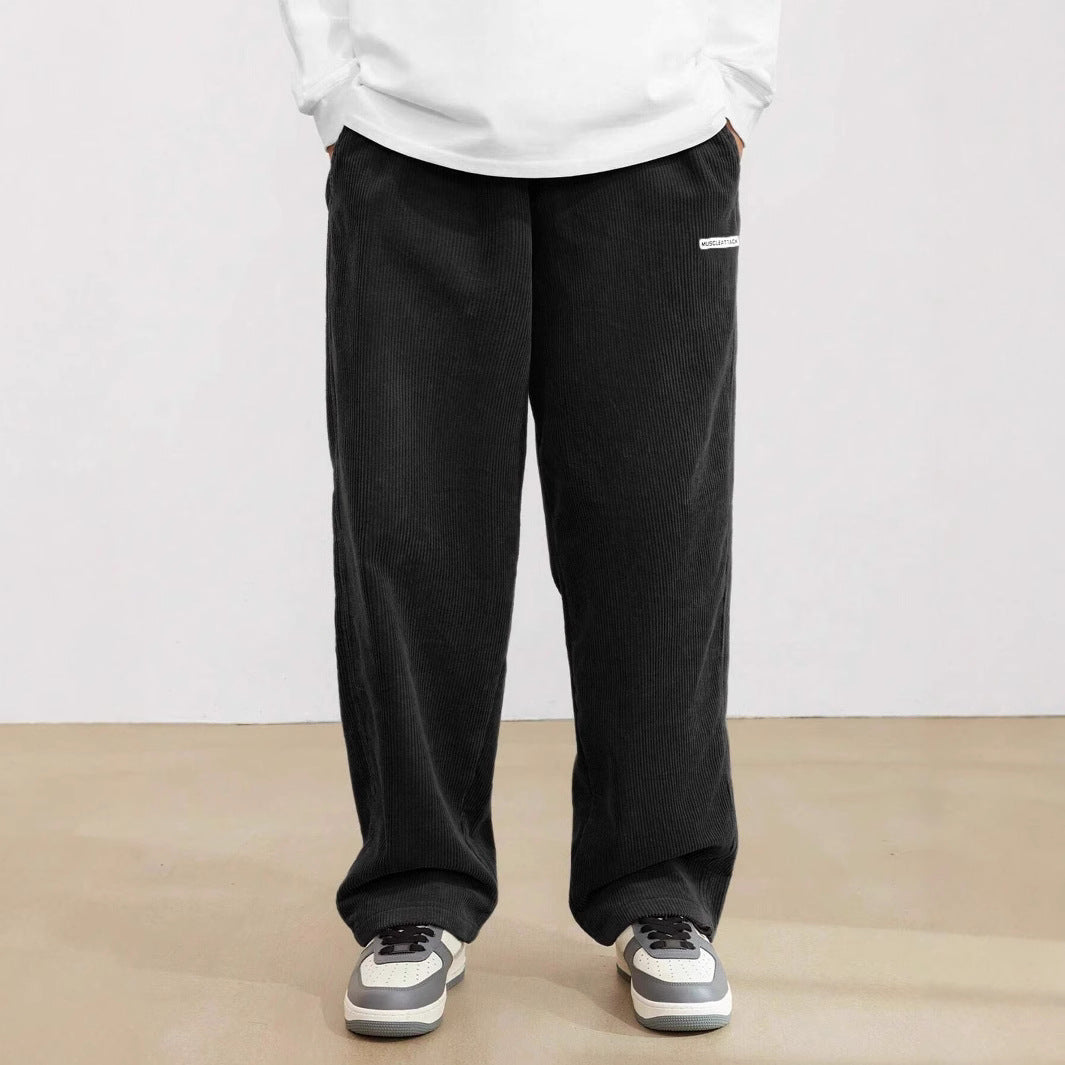 Wide corduroy pants for men with elastic waistband and practical side pockets Chic and Style
