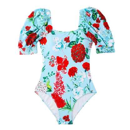 Maillot de bain pour dames avec des manches bouffantes volumineuses et une jupe portefeuille assortie Chic und Stil