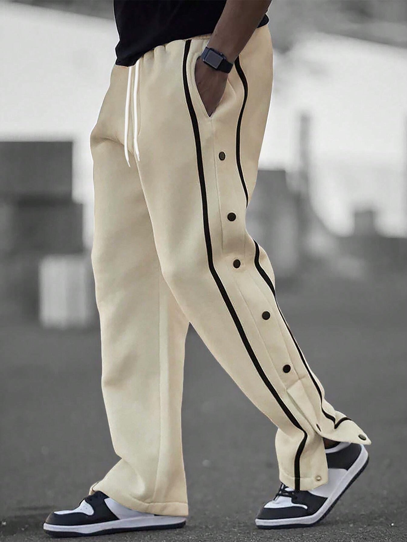 Stylish men's sports pants with snap button details and side pockets Chic and Style