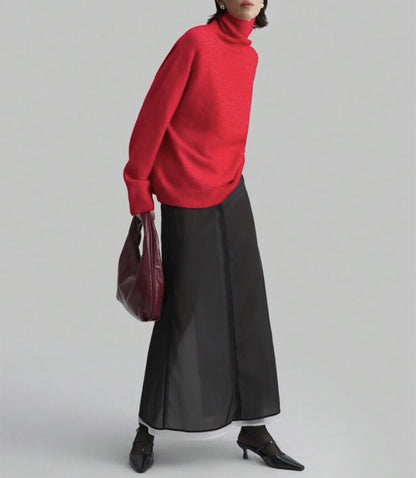 Pull à col roulé féminin à coupe oversize et texture fine Chic und Stil