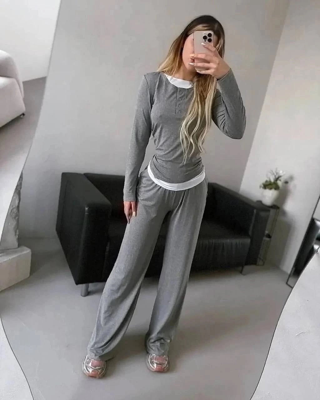 Fashionable lounge set for women with a versatile top and chic elastic pants.