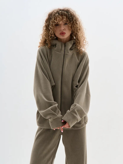 Dame Veste en polaire avec haute fermeture éclair et manches larges Chic und Stil