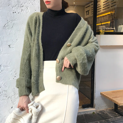 Dames Pull à cardigan douillet avec détails de boutons et design ample Chic und Stil