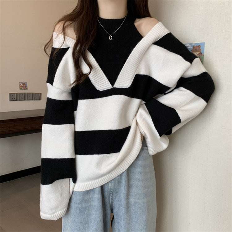 Ladies Oversized V-neck Pullover with trendy striped pattern and open shoulder design Chic and Style